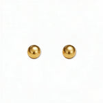 A pair of Ball Stud Earrings 4mm by Skōsh Jewelry, featuring smooth, highly polished round gold balls on post backs, displayed against a white background.