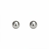 A pair of Ball Stud Earrings 6mm by Skōsh Jewelry, featuring smooth, highly polished round sterling silver balls on post backs, displayed against a white background.