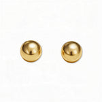 A pair of Ball Stud Earrings 8mm by Skōsh Jewelry, featuring smooth, highly polished round gold balls on post backs, displayed against a white background.
