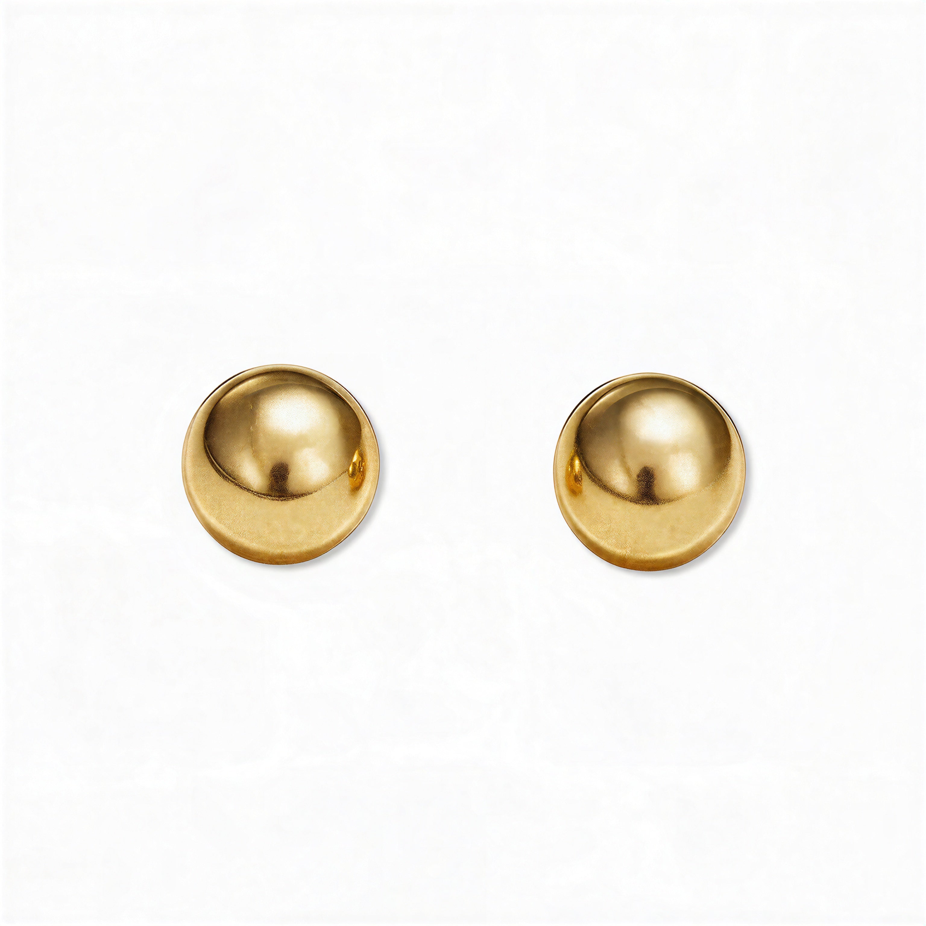A pair of Ball Stud Earrings 8mm by Skōsh Jewelry, featuring smooth, highly polished round gold balls on post backs, displayed against a white background.