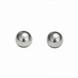 A pair of Ball Stud Earrings 8mm by Skōsh Jewelry, featuring smooth, highly polished round sterling silver balls on post backs, displayed against a white background.