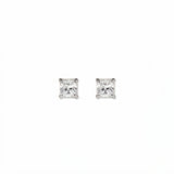 A pair of Princess Cut White Cubic Zirconia Stud Earrings 4mm by Skōsh Jewelry, featuring square princess-cut clear stones in a four-prong sterling silver setting, displayed against a white background.