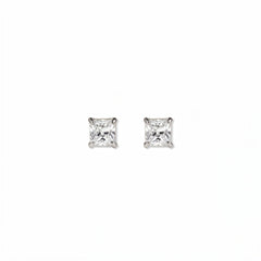 A pair of Princess Cut White Cubic Zirconia Stud Earrings 4mm by Skōsh Jewelry, featuring square princess-cut clear stones in a four-prong sterling silver setting, displayed against a white background.
