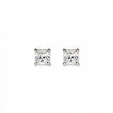 A pair of Princess Cut White Cubic Zirconia Stud Earrings 6mm by Skōsh Jewelry, featuring square princess-cut clear stones in a four-prong sterling silver setting, displayed against a white background.