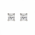 A pair of Princess Cut White Cubic Zirconia Stud Earrings 8mm by Skōsh Jewelry, featuring square princess-cut clear stones in a four-prong sterling silver setting, displayed against a white background.