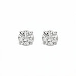 A pair of Round White Cubic Zirconia Stud Earrings 10mm by Skōsh Jewelry, featuring round, faceted clear stones in a four-prong sterling silver setting, displayed against a white background.