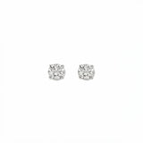 A pair of Round White Cubic Zirconia Stud Earrings 4mm by Skōsh Jewelry, featuring round, faceted clear stones in a four-prong sterling silver setting, displayed against a white background.
