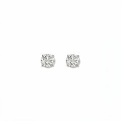 A pair of Round White Cubic Zirconia Stud Earrings 4mm by Skōsh Jewelry, featuring round, faceted clear stones in a four-prong sterling silver setting, displayed against a white background.