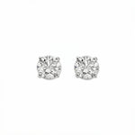 A pair of Round White Cubic Zirconia Stud Earrings 8mm by Skōsh Jewelry, featuring round, faceted clear stones in a four-prong sterling silver setting, displayed against a white background.