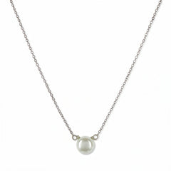 A Luminescence Freshwater Pearl Necklace by Skōsh Jewelry, featuring a single round white freshwater pearl on a fine sterling silver chain, displayed against a white background.