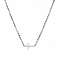 A Skōsh Kids Inline Sideways Cross Necklace by Skōsh Jewelry, featuring a slim polished cross set sideways on a fine sterling silver chain, displayed against a white background.