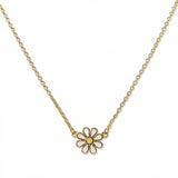 A Skōsh Kids Daisy Necklace by Skōsh Jewelry, featuring a white enamel daisy with a yellow center set on a fine gold chain, displayed against a white background.