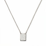 An Engraved Initial Necklace Letter A by Skōsh Jewelry, featuring a small rectangular tag engraved with the letter A on a fine sterling silver chain, displayed against a white background.