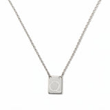 An Engraved Initial Necklace Letter Q by Skōsh Jewelry, featuring a small rectangular tag engraved with the letter Q on a fine sterling silver chain, displayed against a white background.