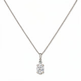 A Skōsh Kids April Birthstone Oval White Cubic Zirconia Necklace by Skōsh Jewelry, featuring an oval faceted clear stone in a prong setting on a fine sterling silver chain, displayed against a white background.