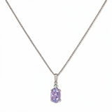 A Skōsh Kids June Birthstone Oval Lavender Cubic Zirconia Necklace by Skōsh Jewelry, featuring an oval faceted light purple stone in a prong setting on a fine sterling silver chain, displayed against a white background.