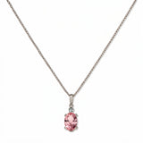 A Skōsh Kids October Birthstone Oval Pink Cubic Zirconia Necklace by Skōsh Jewelry, featuring an oval faceted pink stone in a prong setting on a fine sterling silver chain, displayed against a white background.