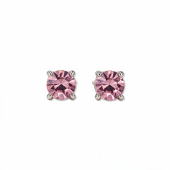 A pair of October Birthstone Round Pink Cubic Zirconia Stud Earrings by Skōsh Jewelry, featuring faceted pink round stones in a four-prong sterling silver setting, displayed against a white background.