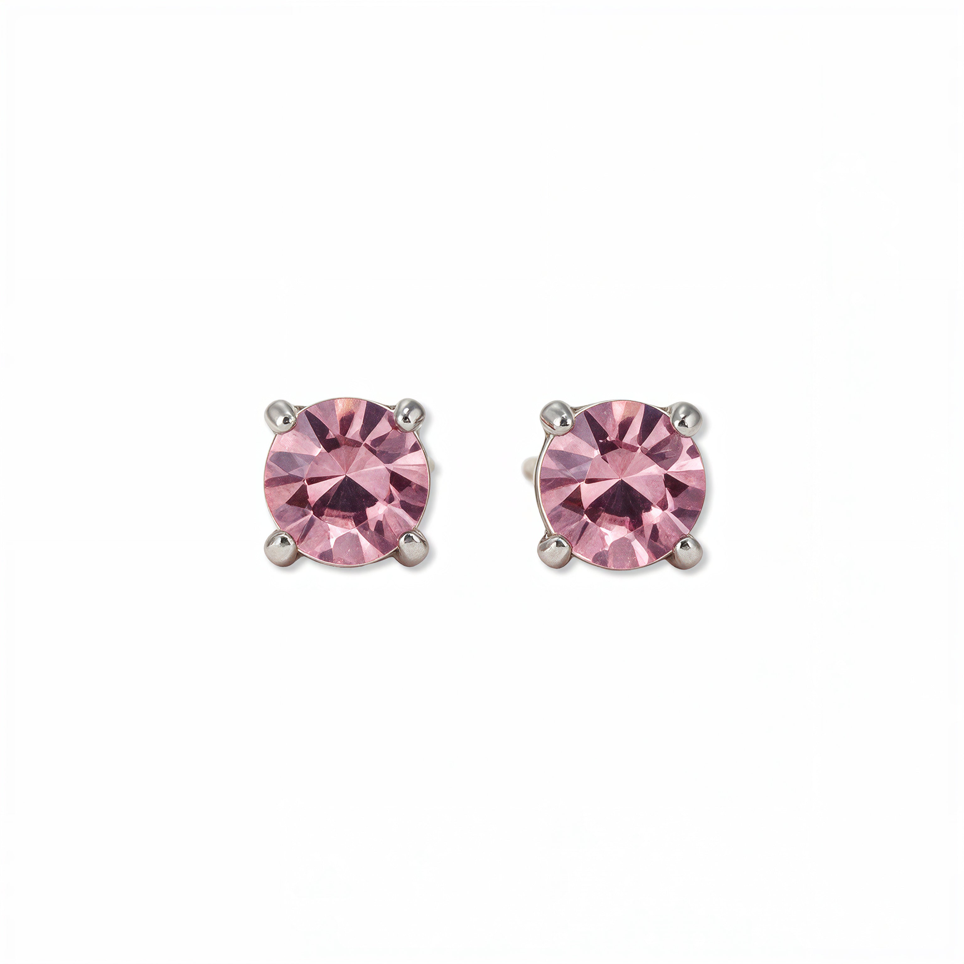 A pair of October Birthstone Round Pink Cubic Zirconia Stud Earrings by Skōsh Jewelry, featuring faceted pink round stones in a four-prong sterling silver setting, displayed against a white background.