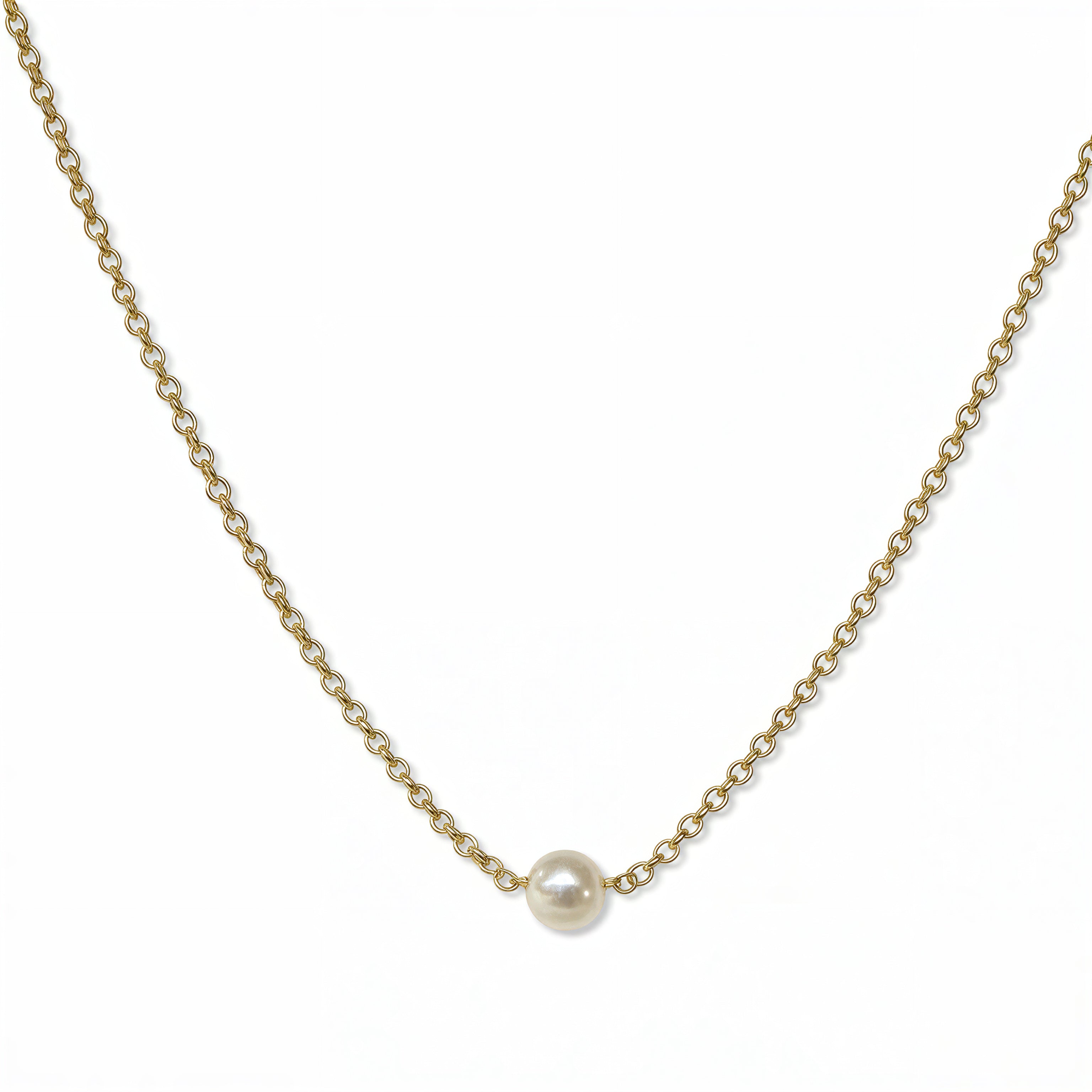 A Skōsh Kids "I'm One" Petite Freshwater Pearl Necklace by Skōsh Jewelry, featuring one small white freshwater pearl along a fine gold chain, displayed against a white background.