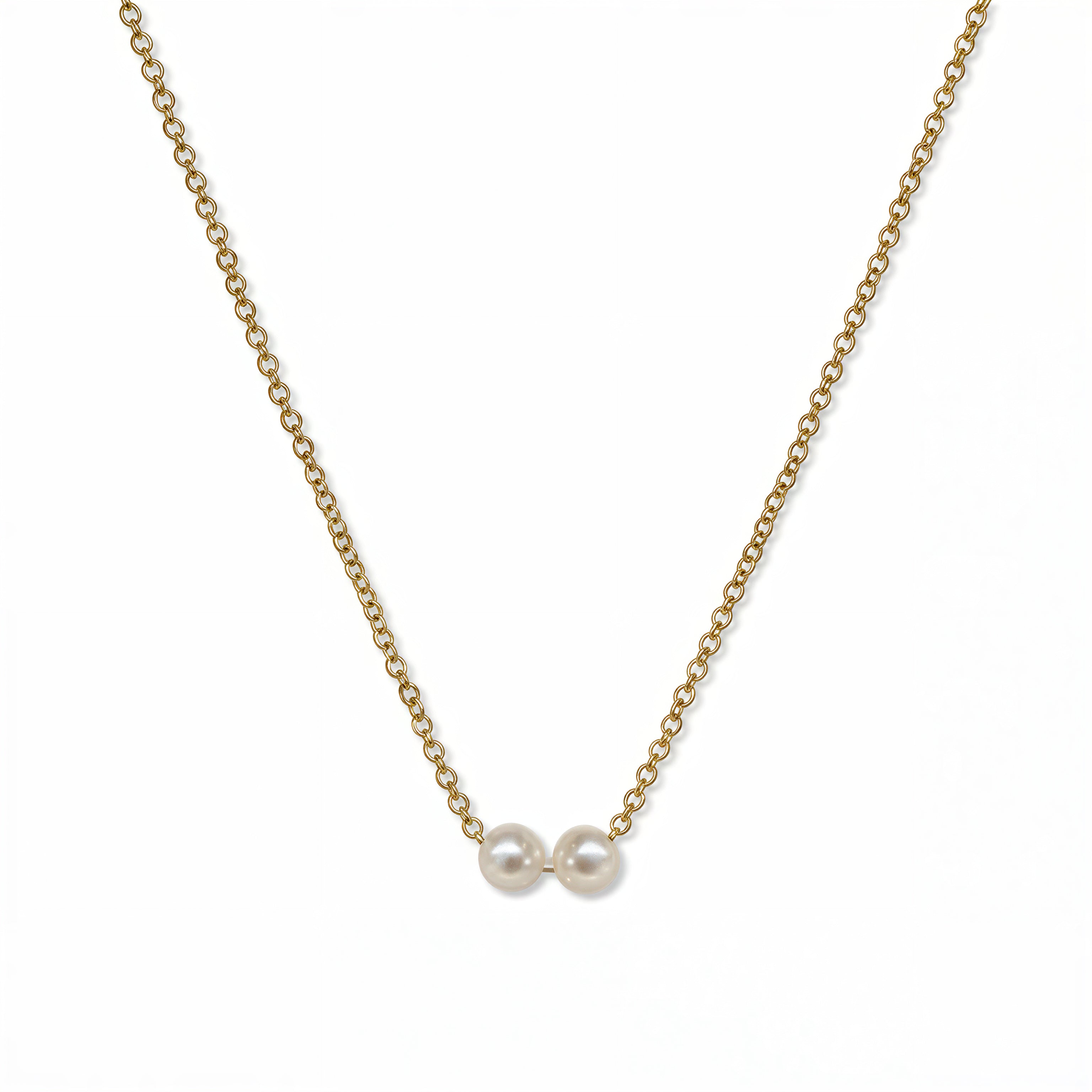 A Skōsh Kids "I'm Two" Petite Freshwater Pearl Necklace by Skōsh Jewelry, featuring two small white freshwater pearls along a fine gold chain, displayed against a white background.