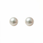 A pair of Freshwater Cultured Pearl 8mm Stud Earrings by Skōsh Jewelry, featuring round, lustrous white freshwater pearls on sterling silver post backs, displayed against a white background.