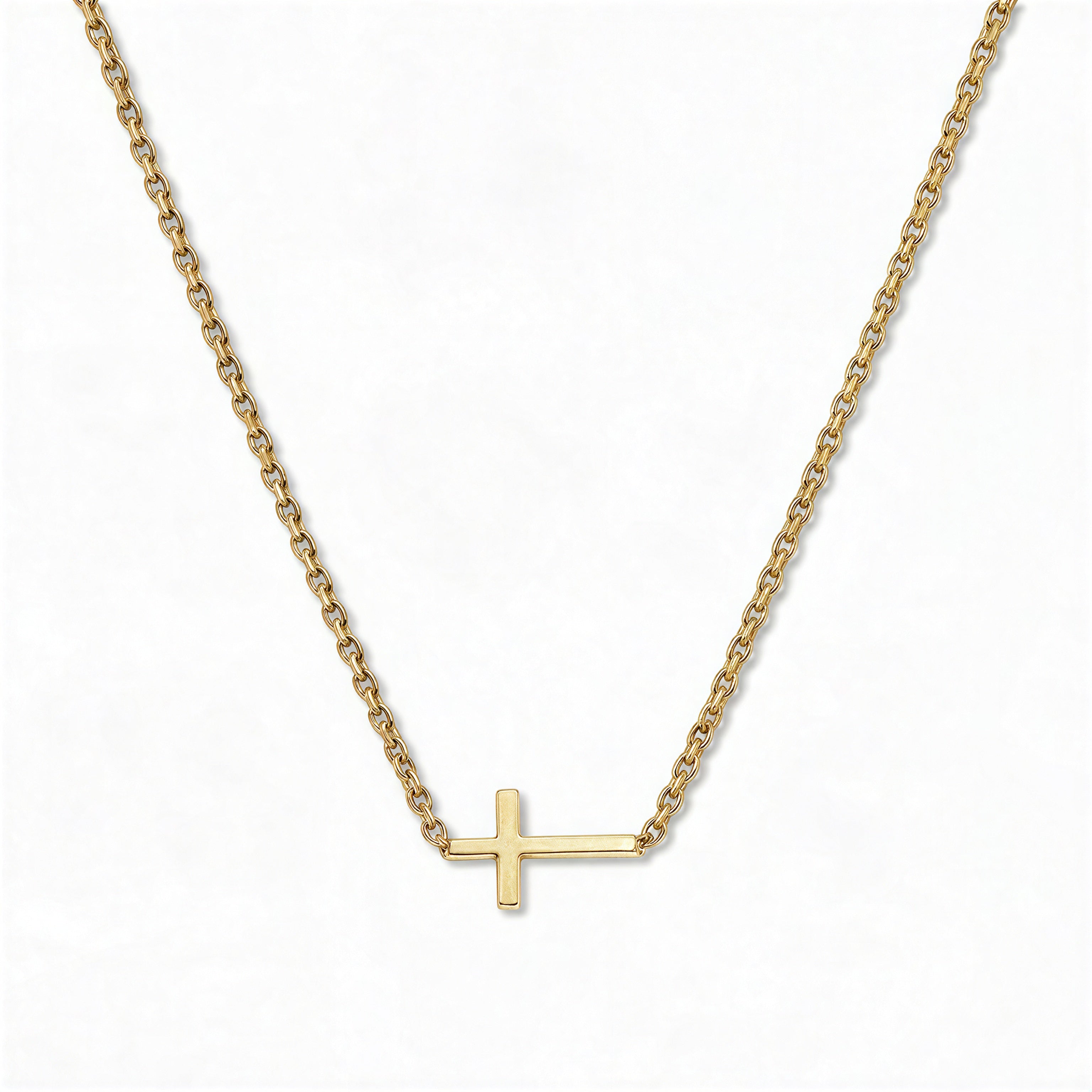 A True Path Inline Sideways Cross Necklace by Skōsh Jewelry, featuring a slim polished cross set sideways on a fine gold chain, displayed against a white background.