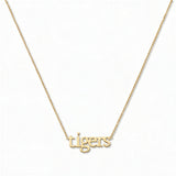 A tigers Gameday Necklace by Skōsh Jewelry, featuring the word 'tigers' in lowercase letters set horizontally on a fine gold chain, displayed against a white background.