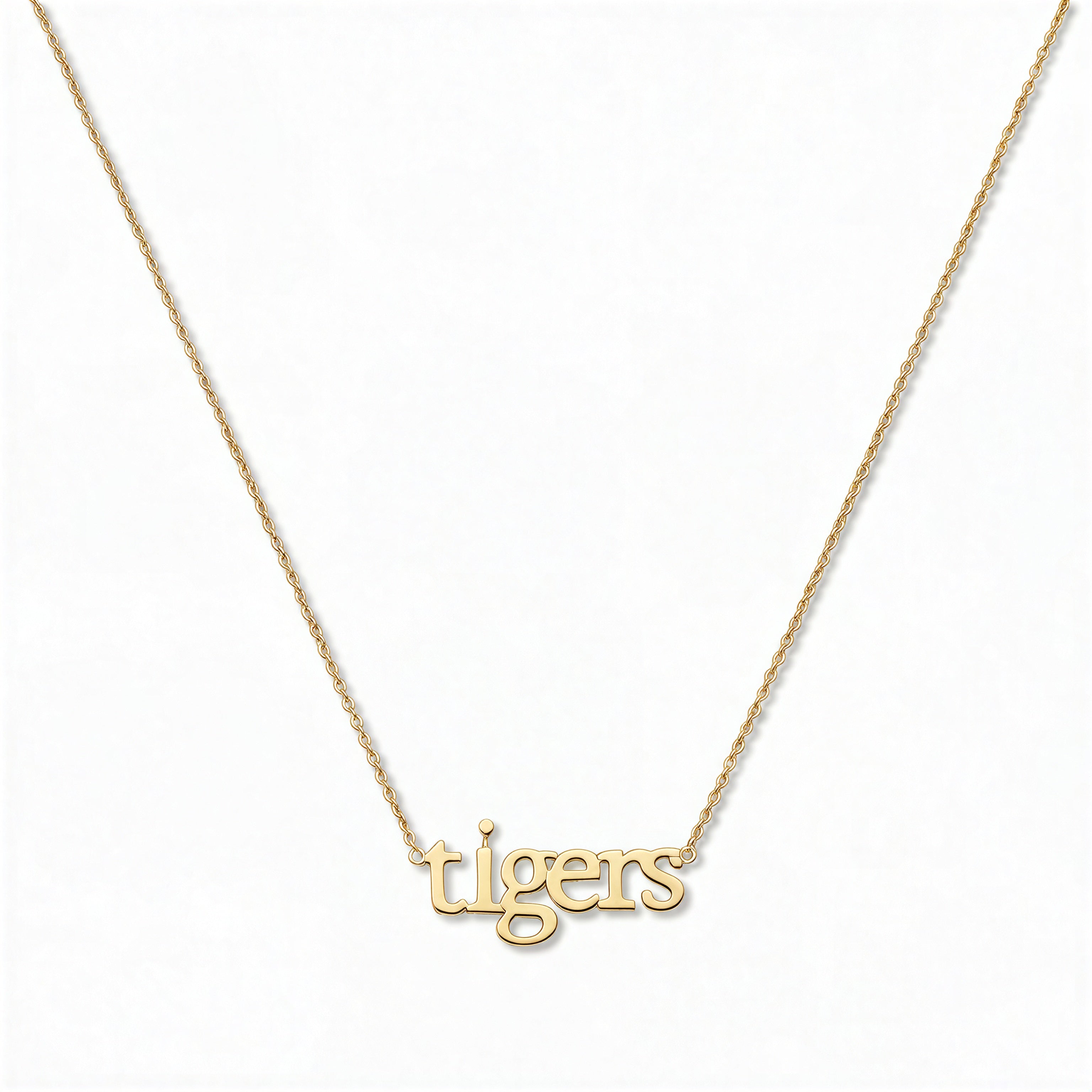 A tigers Gameday Necklace by Skōsh Jewelry, featuring the word 'tigers' in lowercase letters set horizontally on a fine gold chain, displayed against a white background.