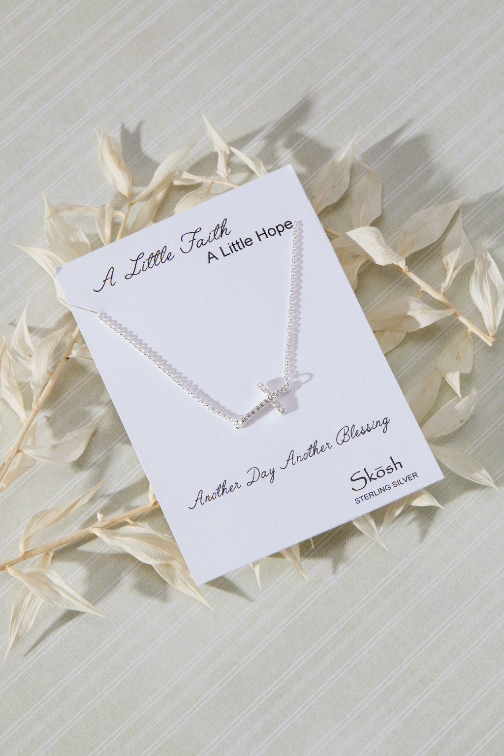 Devoted White Cubic Zirconia Sideways Cross Necklace in sterling silver by Skōsh Jewelry
