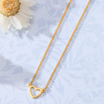 Lucent Mini Heart Necklace in 14K gold over sterling silver by Skōsh Jewelry