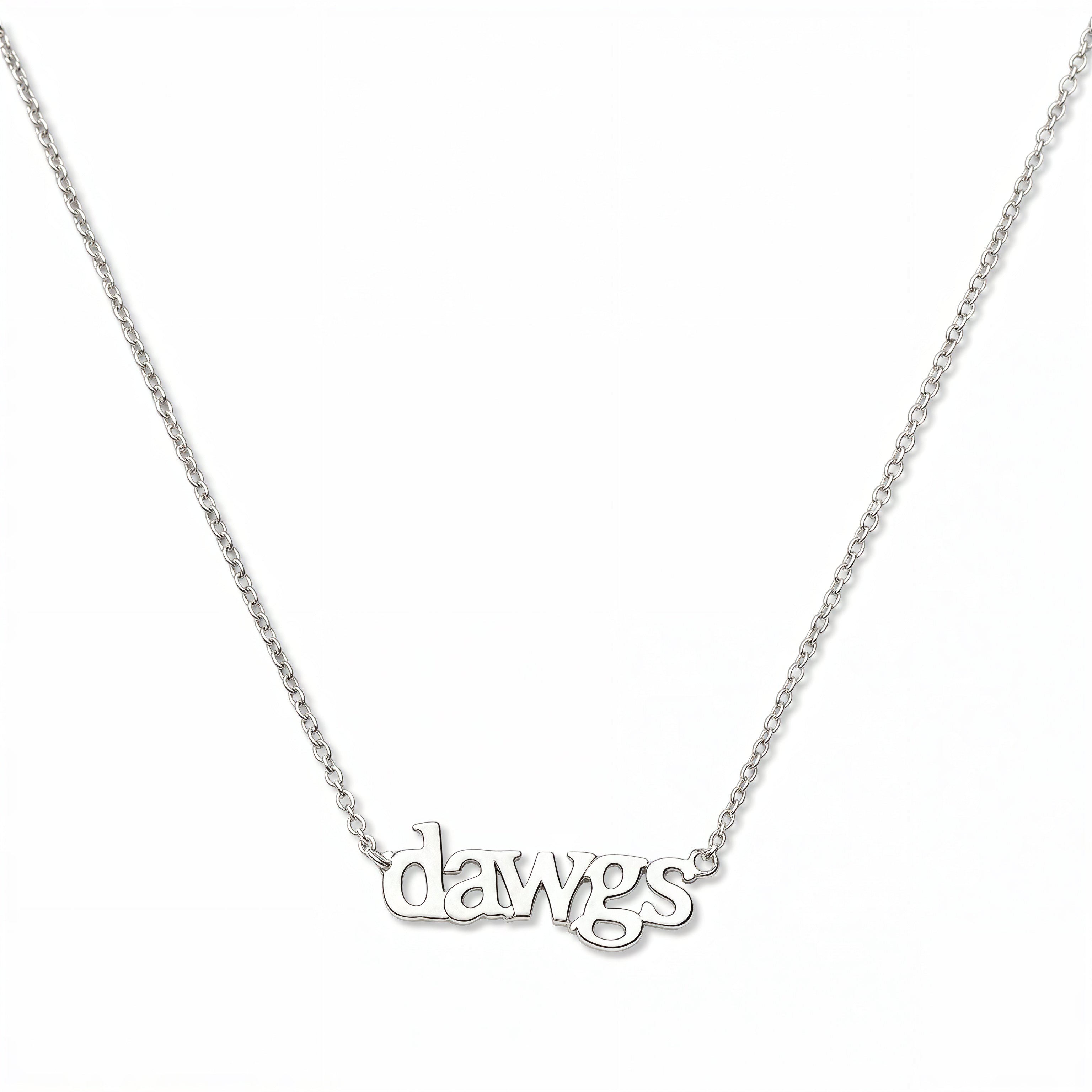 A Dawgs Gameday Necklace by Skōsh Jewelry, featuring the word 'dawgs' in lowercase letters set horizontally on a fine sterling silver chain, displayed against a white background.