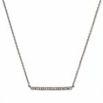 A Luminary White Cubic Zirconia Bar Necklace by Skōsh Jewelry, featuring a long slim bar lined with small clear stones on a fine sterling silver chain, displayed against a white background.