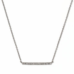 A Luminary White Cubic Zirconia Bar Necklace by Skōsh Jewelry, featuring a long slim bar lined with small clear stones on a fine sterling silver chain, displayed against a white background.