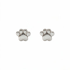 A pair of Bulldogs Paw Print Earrings by Skōsh Jewelry, featuring small polished paw print studs in sterling silver, displayed against a white background.
