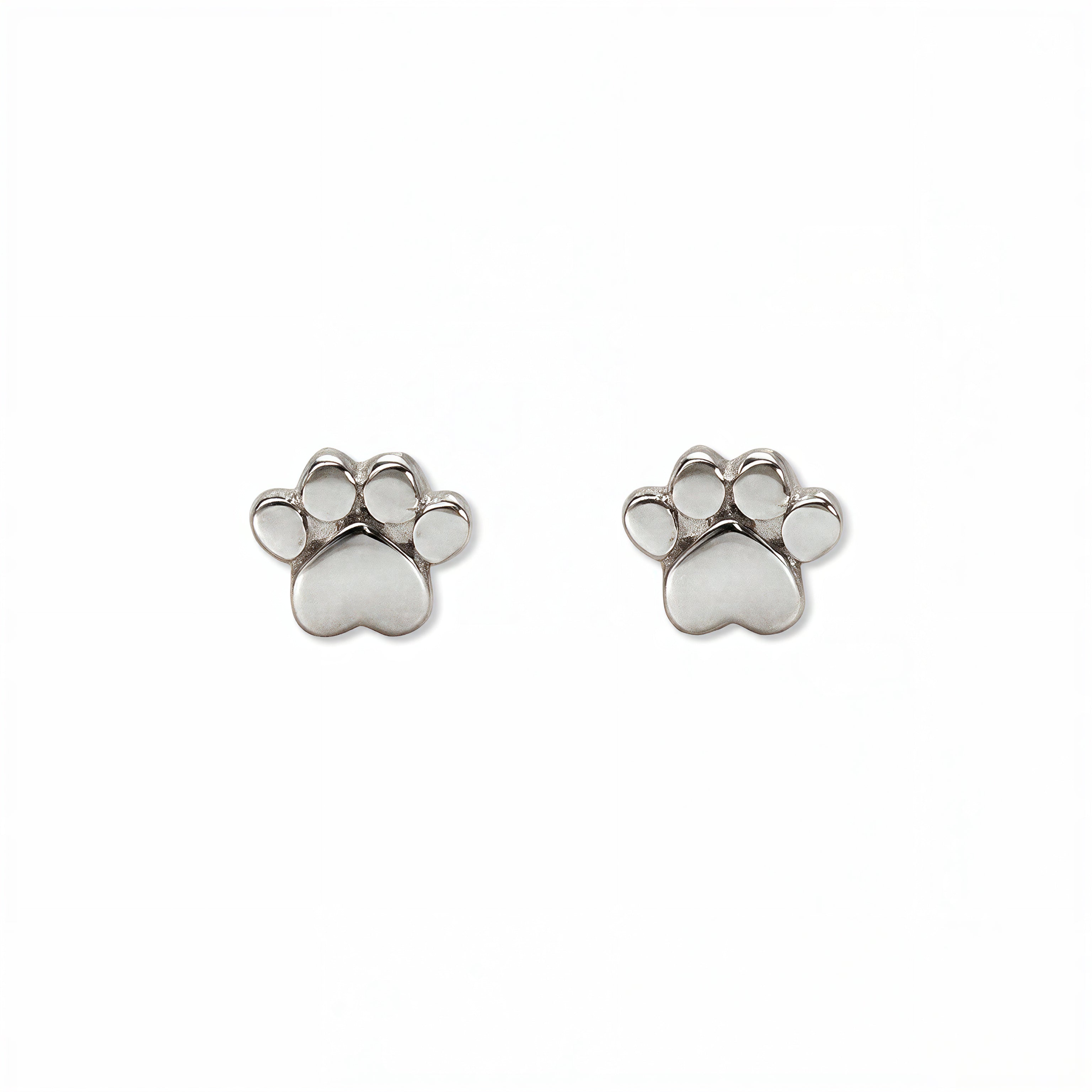 A pair of Bulldogs Paw Print Earrings by Skōsh Jewelry, featuring small polished paw print studs in sterling silver, displayed against a white background.