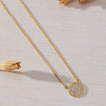 Luna Glow Pavé Disc White Cubic Zirconia Necklace in 14K gold over sterling silver by Skōsh Jewelry