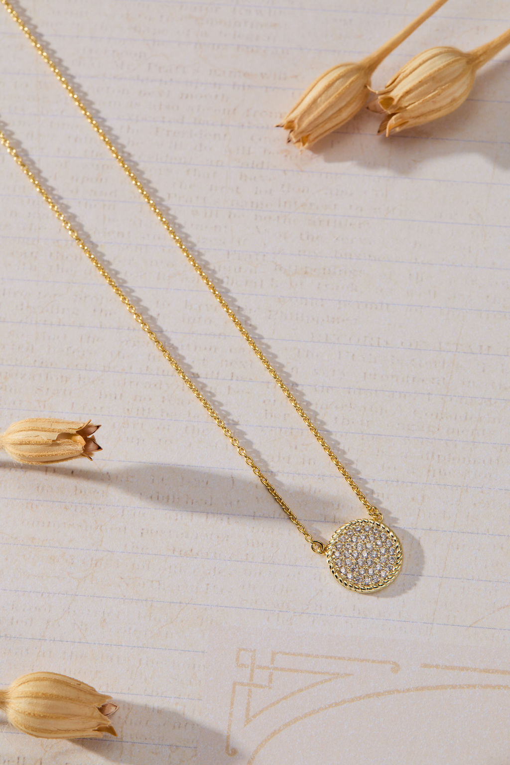 Luna Glow Pavé Disc White Cubic Zirconia Necklace in 14K gold over sterling silver by Skōsh Jewelry