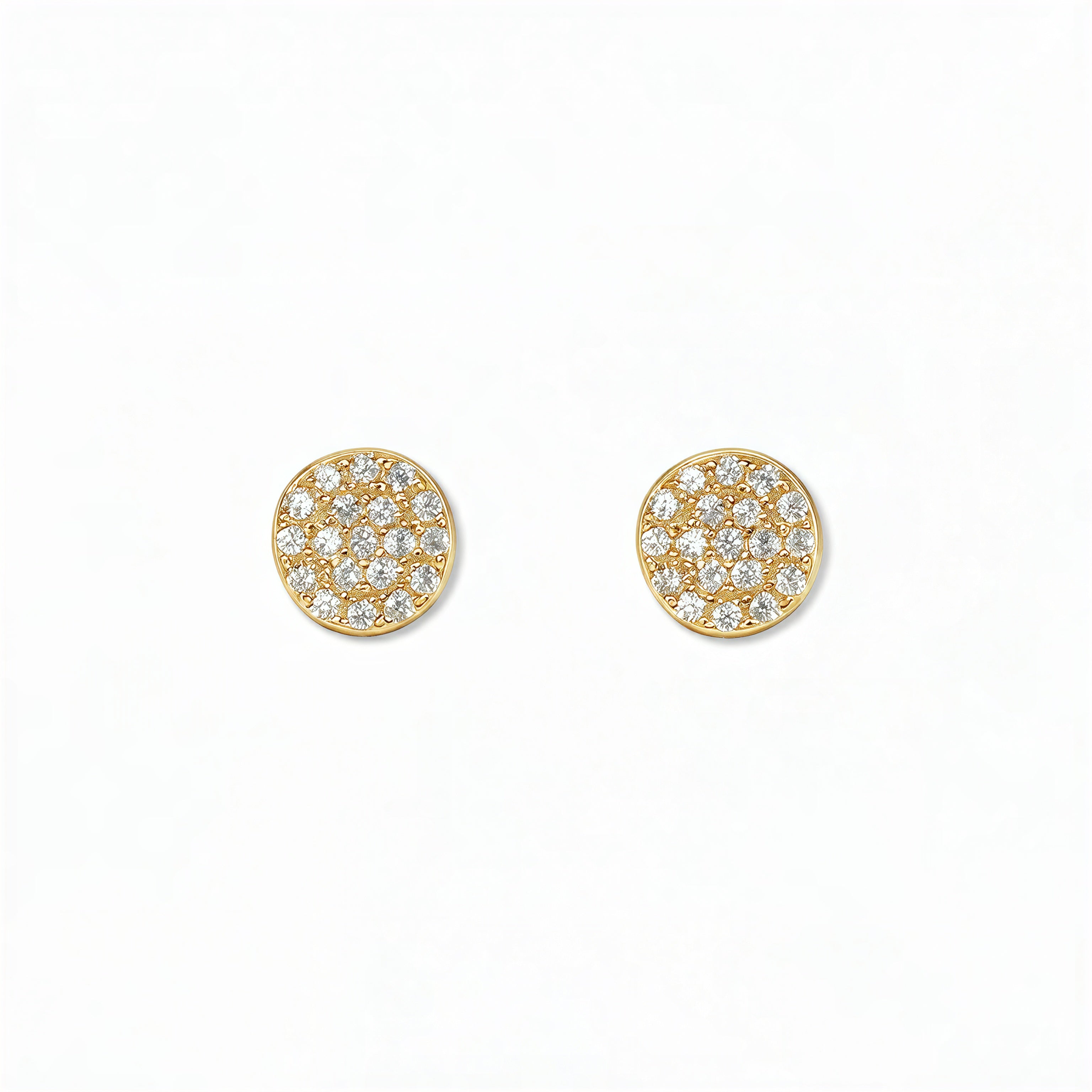 A pair of Luna Glow Pavé Disc White Cubic Zirconia Earrings by Skōsh Jewelry, featuring round discs covered in small clear pavé stones set in gold, displayed against a white background.
