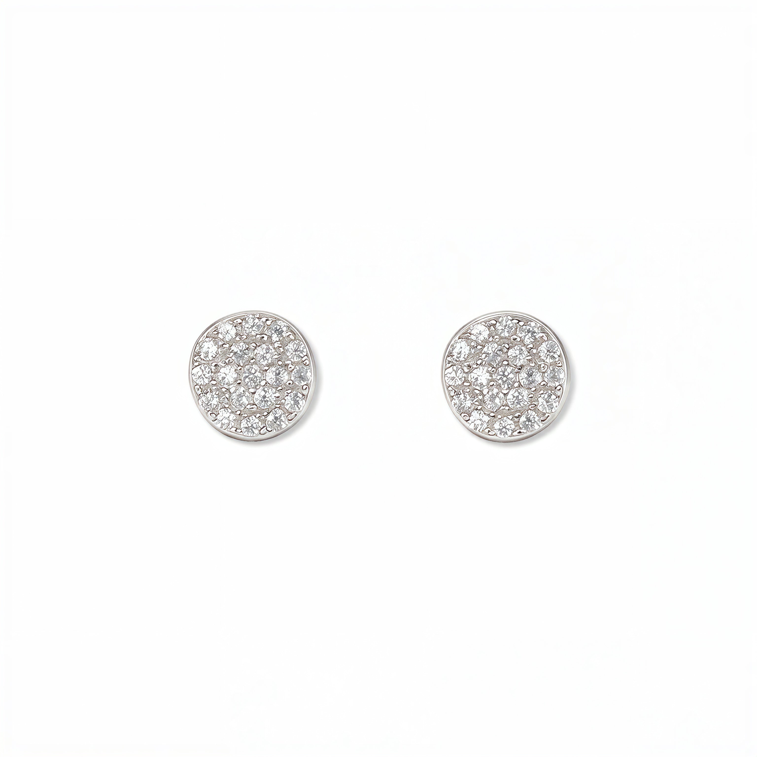 A pair of Luna Glow Pavé Disc White Cubic Zirconia Earrings by Skōsh Jewelry, featuring round discs covered in small clear pavé stones set in sterling silver, displayed against a white background.