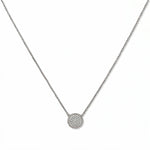 A Purelight Pavé Disc White Cubic Zirconia with Braided Halo Necklace by Skōsh Jewelry, featuring a round pavé disc of clear stones framed by a braided sterling silver halo on a fine chain, displayed against a white background.