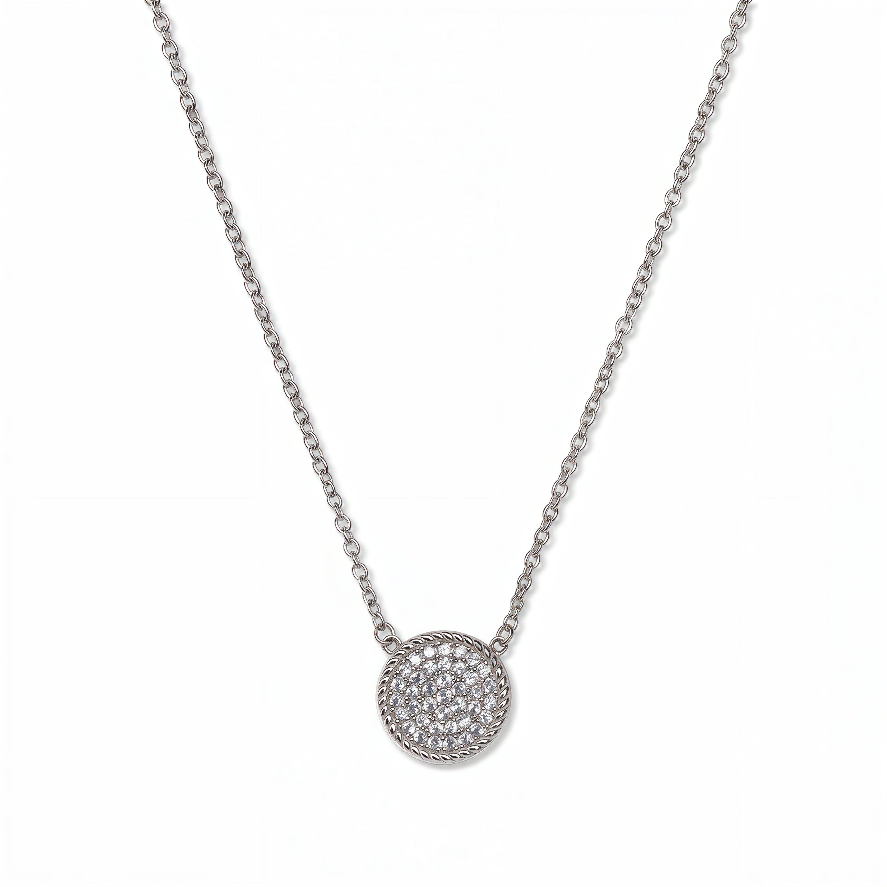 A Purelight Pavé Disc White Cubic Zirconia with Braided Halo Necklace by Skōsh Jewelry, featuring a round pavé disc of clear stones framed by a braided sterling silver halo on a fine chain, displayed against a white background.