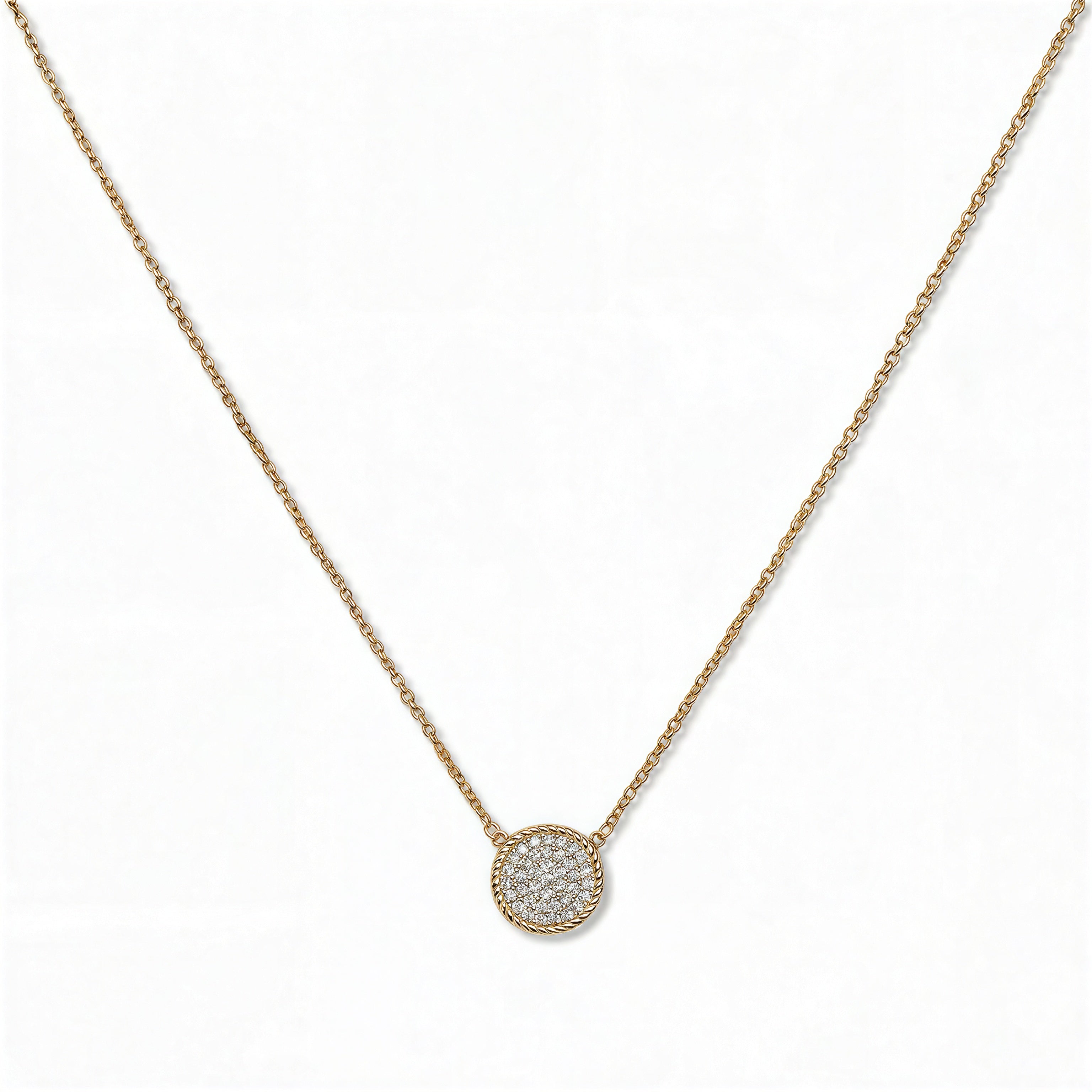 A Purelight Pavé Disc White Cubic Zirconia with Braided Halo Necklace by Skōsh Jewelry, featuring a round pavé disc of clear stones framed by a braided gold halo on a fine chain, displayed against a white background.