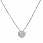 An Affection Pavé Heart White Cubic Zirconia Necklace by Skōsh Jewelry, featuring a puffed heart covered in small clear pavé stones on a fine sterling silver chain, displayed against a white background.