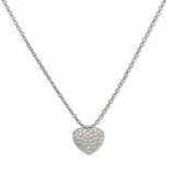 An Affection Pavé Heart White Cubic Zirconia Necklace by Skōsh Jewelry, featuring a puffed heart covered in small clear pavé stones on a fine sterling silver chain, displayed against a white background.