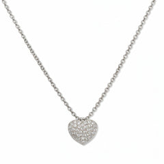 An Affection Pavé Heart White Cubic Zirconia Necklace by Skōsh Jewelry, featuring a puffed heart covered in small clear pavé stones on a fine sterling silver chain, displayed against a white background.