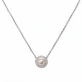A Freshwater Pearl with White Cubic Zirconia Halo Necklace by Skōsh Jewelry, featuring a round white freshwater pearl surrounded by a halo of small clear stones on a fine sterling silver chain, displayed against a white background.