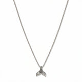 A Mermaid Tail Pendant Necklace by Skōsh Jewelry, featuring a small textured mermaid tail pendant on a fine sterling silver chain, displayed against a white background.