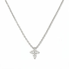 A Faithful Mini Cross with White Cubic Zirconia Necklace by Skōsh Jewelry, featuring a petite cross formed from small clear stones on a fine sterling silver chain, displayed against a white background.