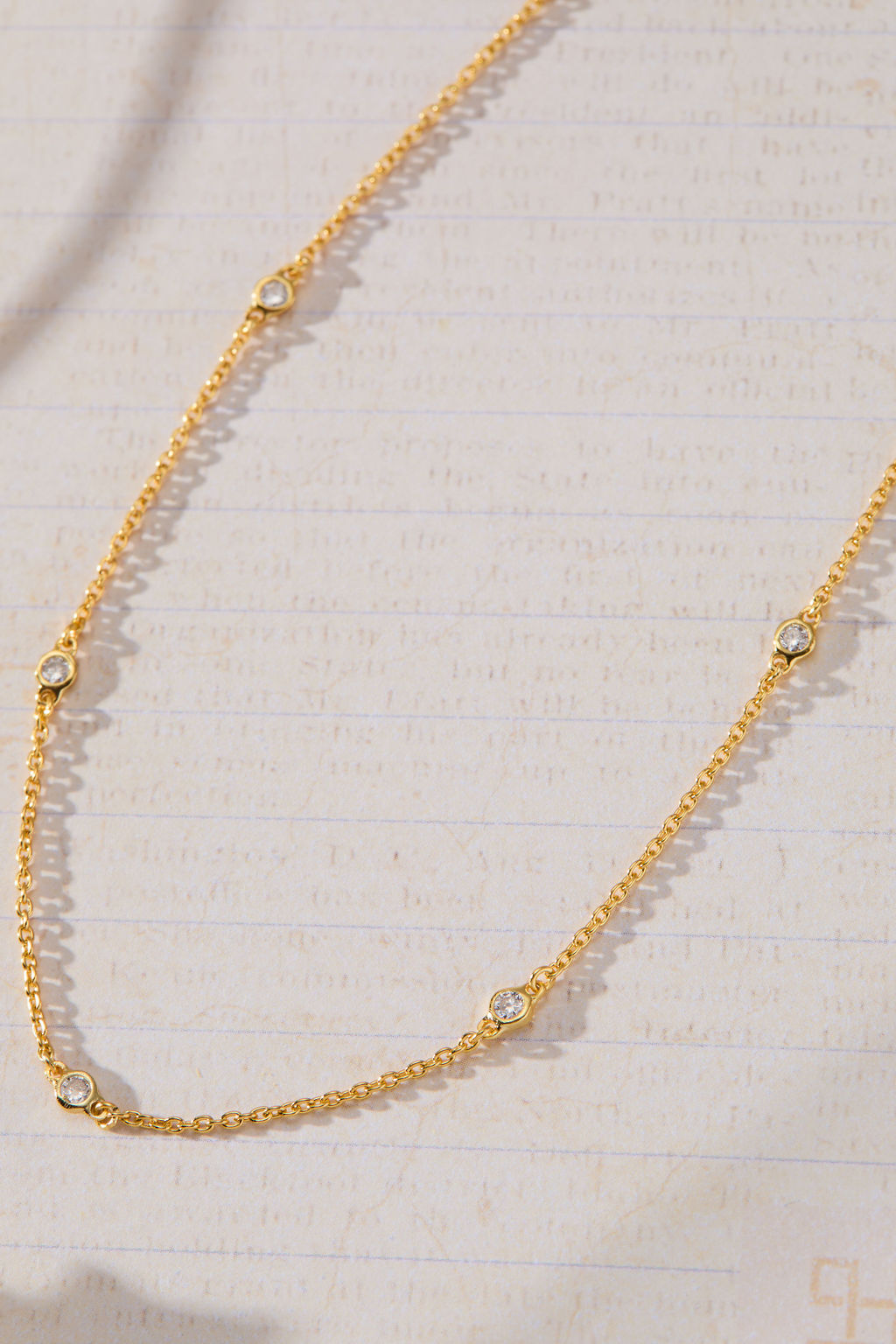Sanctuary Bezel Set White Cubic Zirconia Station Necklace in 14K gold over sterling silver by Skōsh Jewelry